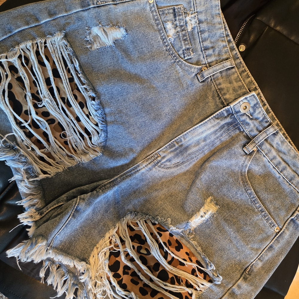 Stylish Light Blue Distressed Denim Shorts With Cheetah Accent - Picture 2 of 4